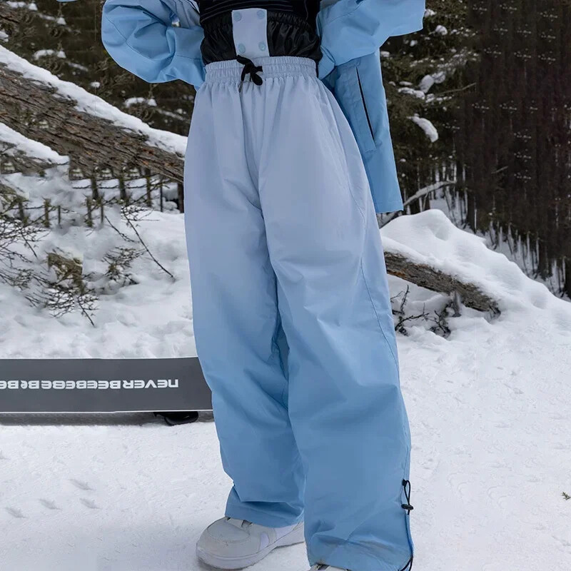 Új téli snowboardos sínadrág 2025 sínadrág szélálló vízálló meleg tartós kültéri bő hónadrág férfi női