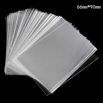 100 buc/lot 65mm * 90mm capac de protecție transparent pentru carte de vizită pentru jocuri de masă, carduri, insigne, mâneci, husă de protecție