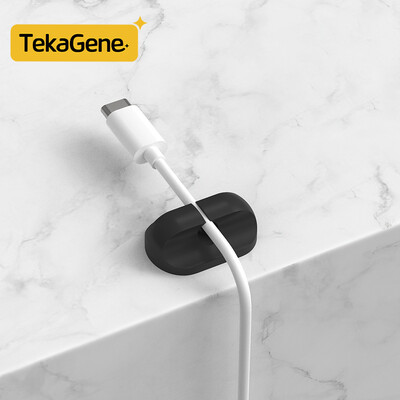 Kabeļu organizētāja pārvaldības vadu turētājs Elastīgs USB kabeļa uztīšanas kārtīgs silikona klipu turētājs Kabeļa organizatora turētājs tālrunim