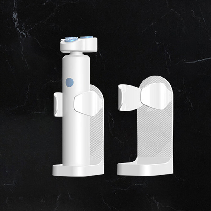 Vonios skutimosi stovo prie sienos tvirtinamas skutimosi peiliuko laikiklis Elektrinis dantų šepetėlio laikiklis Vietą taupantis be pėdsakų dantų šepetėlio laikiklis