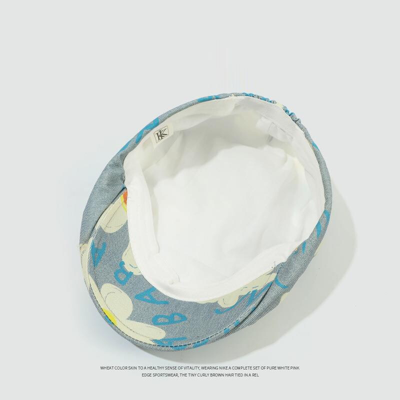 Ženska kapa s beretkom od poliestera s dizajnom grafita i uzorkom tratinčica, podesivim opsegom glave 55-59 cm Four Seasons