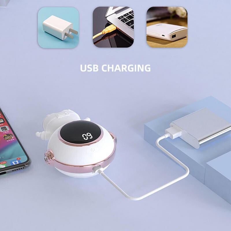 Električni grijač za ruke za višekratnu upotrebu Električni prijenosni džepni grijač u obliku astronauta, topla i hladna zaštita, alat savršen za vanjsku upotrebu