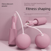 Du viename tylus riebalus deginantis fitneso šuolis su kamuoliu vidaus sportui su mažu kamuoliu sveriamas didelis šuolis