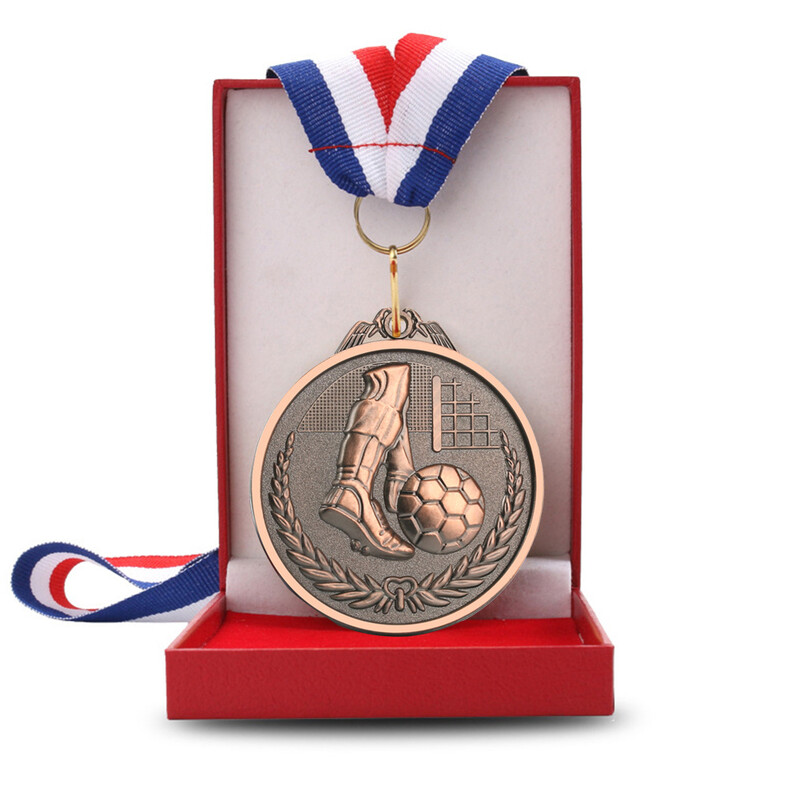 Medalje za školske igre Legura cinka Medalje za nogometna natjecanja Kolekcija otporna na habanje Zlato Srebro Bronca Školski pribor