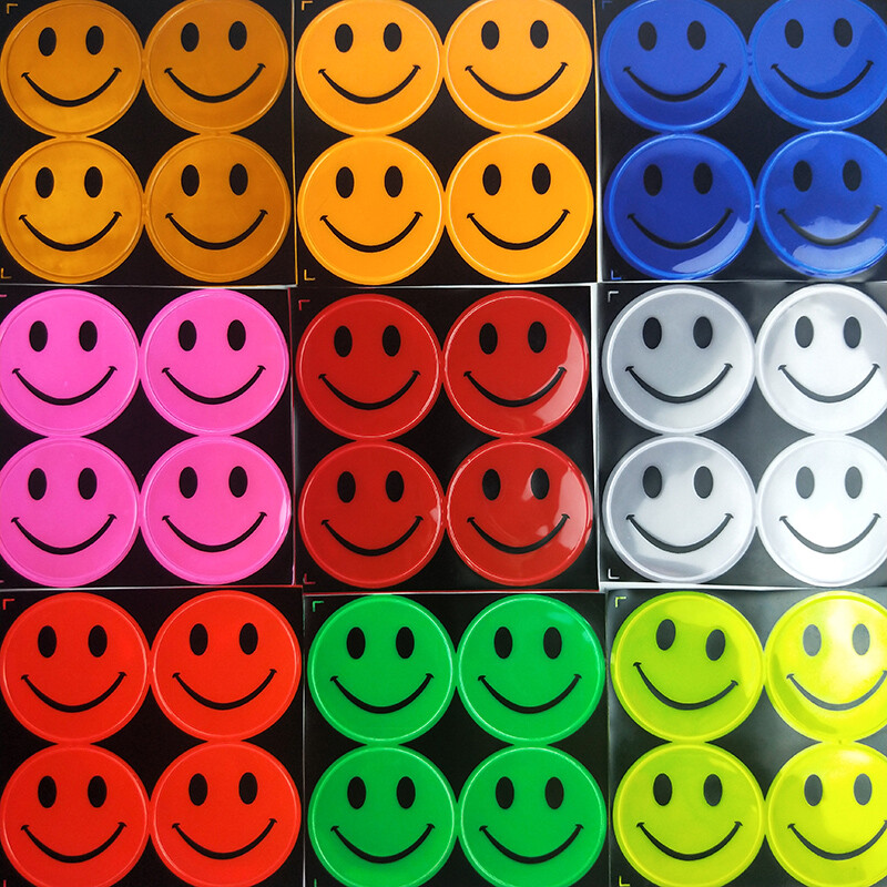 Armas naeratava näoga helkurkleebis Multifilmi koolikott Jalgratta mootorratta tõukeratta kleebis liiklusohutuse tagamiseks