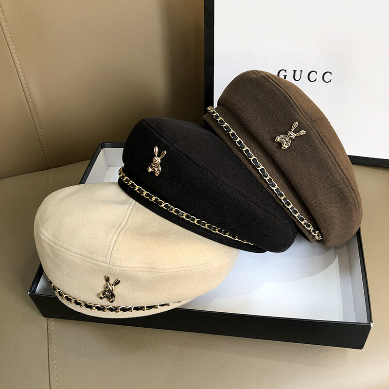 Édes menő fém lánc svájcisapka női brit retro csillagánizs kalap őszi és téli koreai változat divat bimbó festő kalapdagály