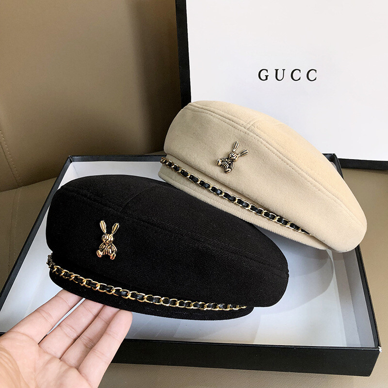 Édes menő fém lánc svájcisapka női brit retro csillagánizs kalap őszi és téli koreai változat divat bimbó festő kalapdagály