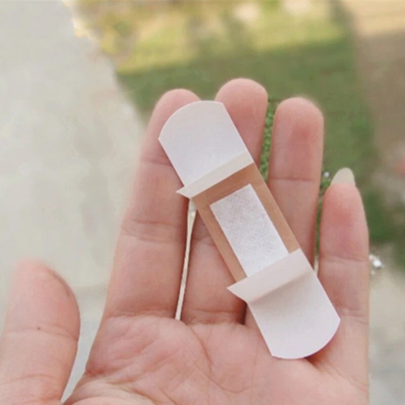 Kvėpuojanti juostinė pagalba vandeniui nepralaidus tvarstis Pirmosios pagalbos žaizdų tvarsčiai Medicininė juosta žaizdų gipso pagalbos rinkiniai Tvarsčiai