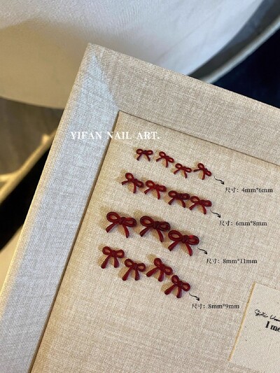 50 kom. Mini mašnica od smole crvene boje vina Jednostavne linije Privjesci za nokte s lukom u čvorove 3D ukrasi za nokte od smole DIY dodaci za nokte