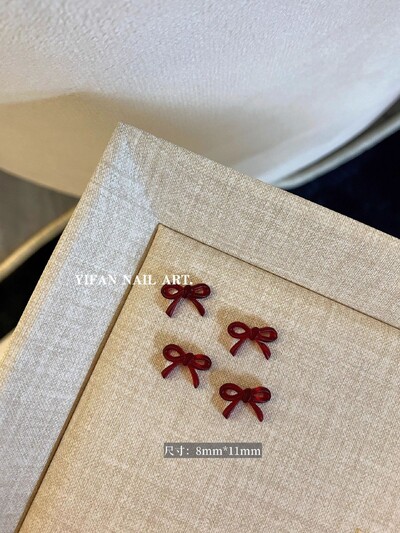 50 kom. Mini mašnica od smole crvene boje vina Jednostavne linije Privjesci za nokte s lukom u čvorove 3D ukrasi za nokte od smole DIY dodaci za nokte