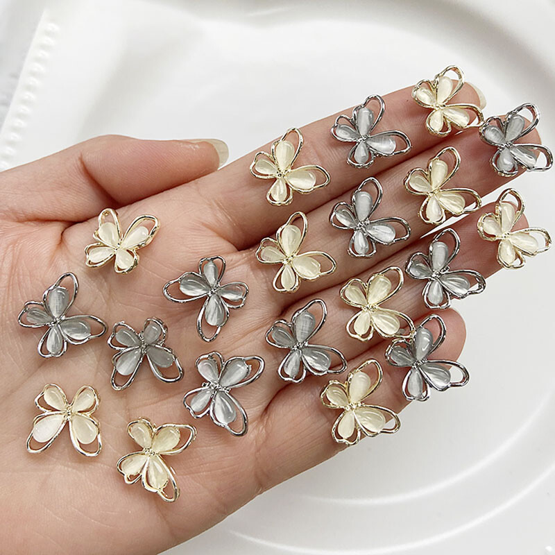 10kom Srebrno bijeli kristalni leptir privjesak za nokte 3D šuplje mačje oko od legure cirkona Dragulji za nokte Luksuzni dijamantni privjesak za nokte leptir