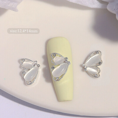 10 komada Pola mačje oko leptir Nail Art šarm 3D legure sjajni prozirni leptir ukrasi za nokte DIY luksuzni dodaci za nokte