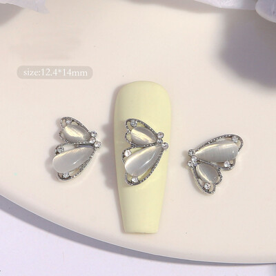 10 komada Pola mačje oko leptir Nail Art šarm 3D legure sjajni prozirni leptir ukrasi za nokte DIY luksuzni dodaci za nokte