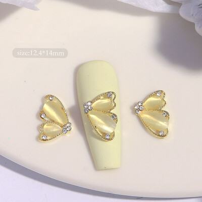 10 komada Pola mačje oko leptir Nail Art šarm 3D legure sjajni prozirni leptir ukrasi za nokte DIY luksuzni dodaci za nokte