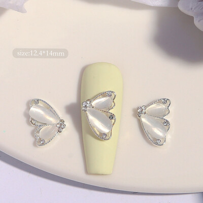 10 komada Pola mačje oko leptir Nail Art šarm 3D legure sjajni prozirni leptir ukrasi za nokte DIY luksuzni dodaci za nokte