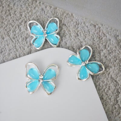 10 komada Pola mačje oko leptir Nail Art šarm 3D legure sjajni prozirni leptir ukrasi za nokte DIY luksuzni dodaci za nokte