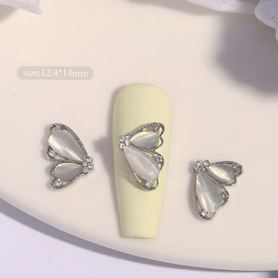 10 komada Pola mačje oko leptir Nail Art šarm 3D legure sjajni prozirni leptir ukrasi za nokte DIY luksuzni dodaci za nokte