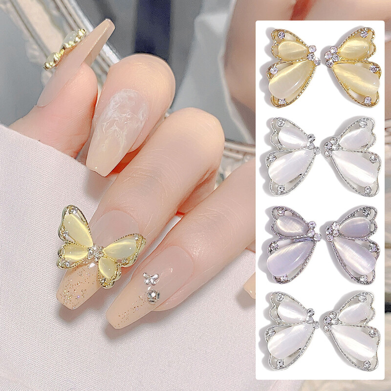 10 komada Pola mačje oko leptir Nail Art šarm 3D legure sjajni prozirni leptir ukrasi za nokte DIY luksuzni dodaci za nokte