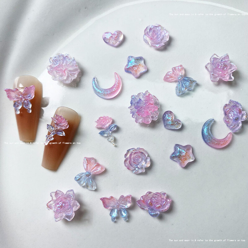 50 komada Mix Svjetleći ružin cvijet Nail Art Charms Mjesec Zvijezda Srce Aurora Butterfly Ukrasi za nokte Charms Y2K DIY dijelovi za manikuru