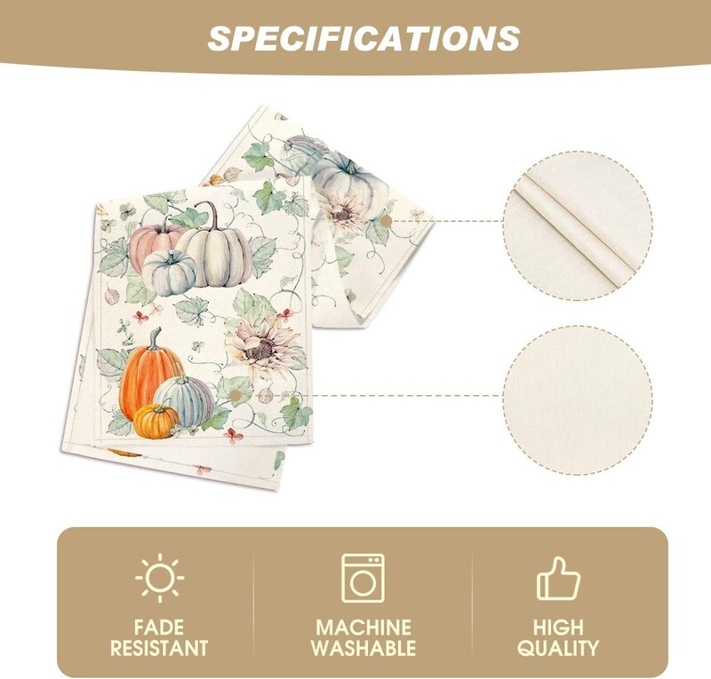 Rudeniniai moliūgai, gėlės, lapai, baltiniai ant stalo, sezoniniai, rudens padėkos dienos stalviršiai, skirti virtuvės vakarėliui valgomojo stalo dekoravimui