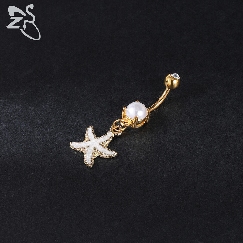 Piercing do pupka z nehrdzavejúcej ocele 14G zlatej farby s hadím srdcom a lesklým CZ krištáľom v tvare motýľa.