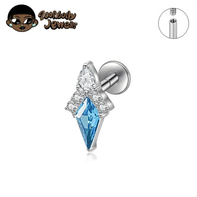 Piercing do ucha s diamantom, modrým a zlatým náušnicou, ASTM F136, titánové náušnice, chrupavka, špirála, tragus, lastúra, šperky.