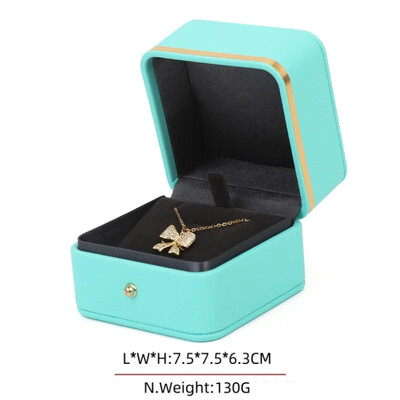 Stoc cu ridicata Ambalaj de bijuterii elegante cu ornamente și butoane din aur Cutie cadou din piele PU cu colț rotund, cu pandantiv, ceas cu brățară