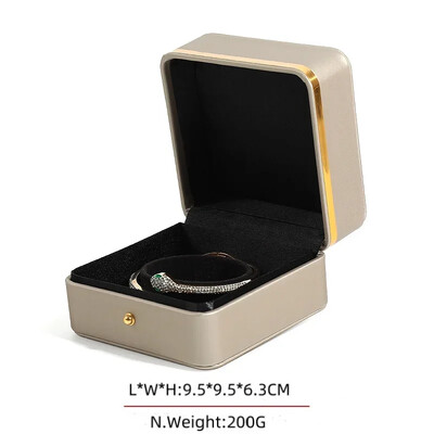 Stoc cu ridicata Ambalaj de bijuterii elegante cu ornamente și butoane din aur Cutie cadou din piele PU cu colț rotund, cu pandantiv, ceas cu brățară