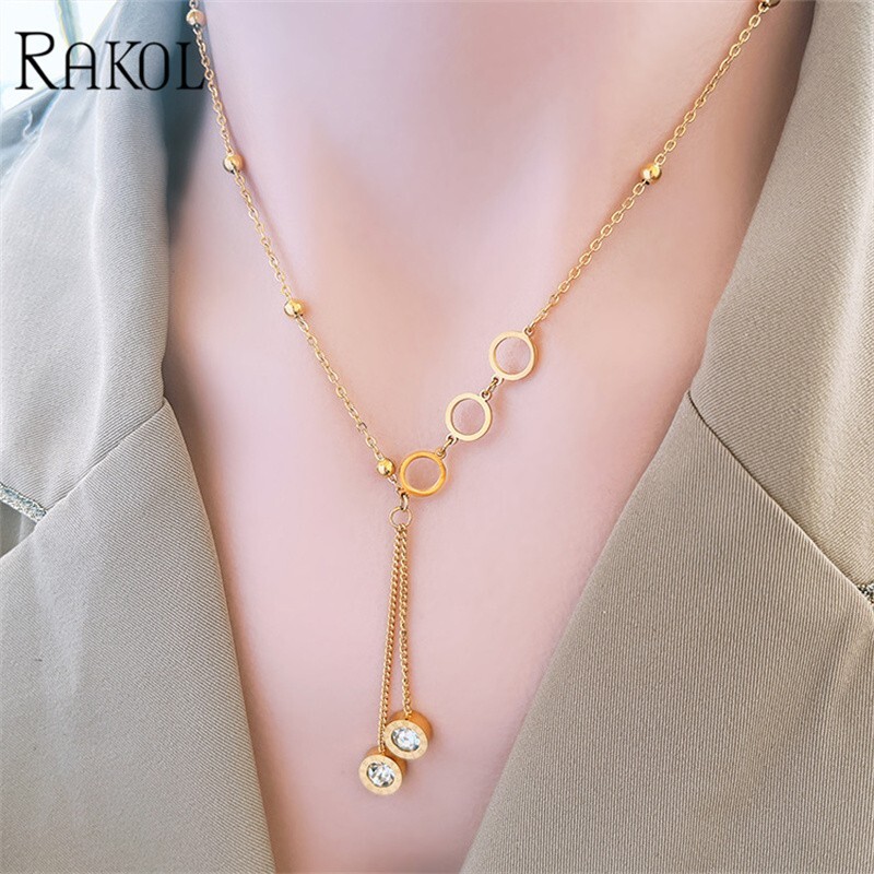 RAKOL Ogrlica od nehrđajućeg čelika s rimskim brojevima za žene Zlatne modne ogrlice s dugim privjescima od cirkona Nakit za djevojčice
