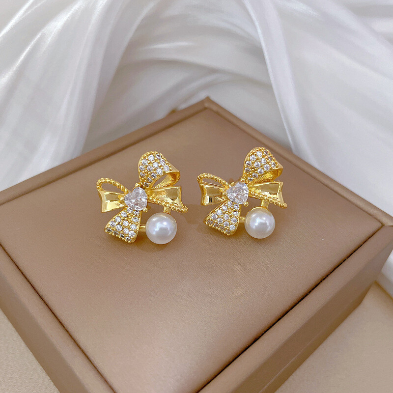 Klasszikus rozsdamentes acél gyönyörű gyöngy masni nyaklánc fülbevaló Divatos és remek temperamentumú esti kiegészítők