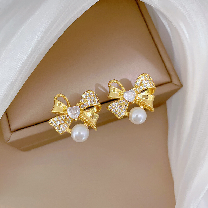 Klasszikus rozsdamentes acél gyönyörű gyöngy masni nyaklánc fülbevaló Divatos és remek temperamentumú esti kiegészítők