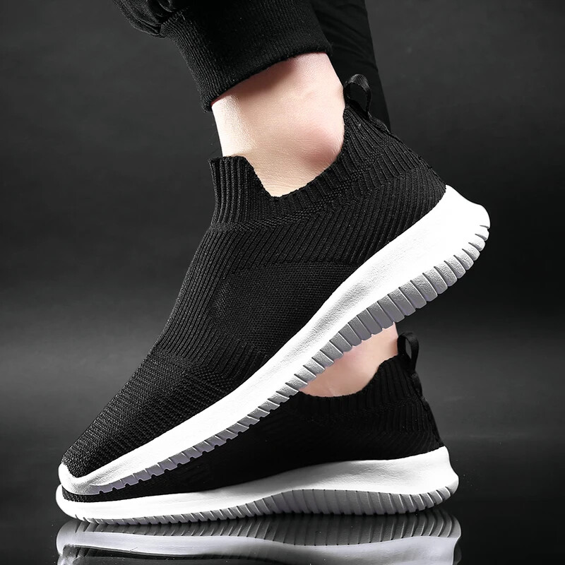 Jednobojne bijele modne pletene cipele za slobodno vrijeme Muške super lagane prozračne rastezljive čarape Tenisice Slip On Tenis Masculino Black Zapato