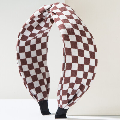 A geometrikus kockás szövetből készült hajpánt koreai változata, népszerű az interneten, egyszerű és széles élű cCross divatos fejpánt