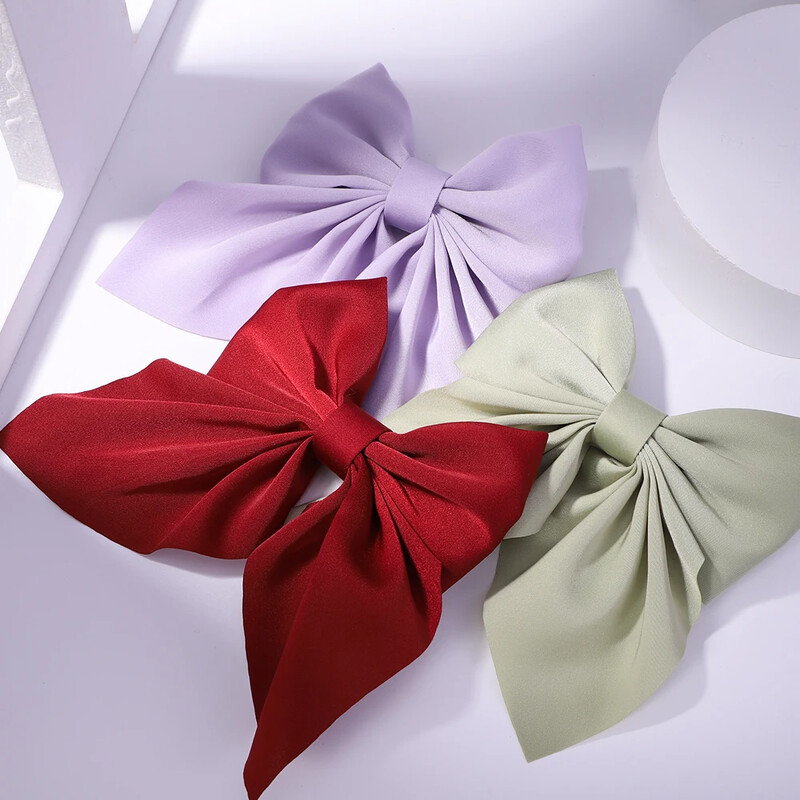 Új Sweet Bows Hajtűk Egyszínű Bowknot Hajcsatok Lányoknak Szatén Pillangó Barrettes Kacsacsőrű Clip gyerekeknek Hajkiegészítők
