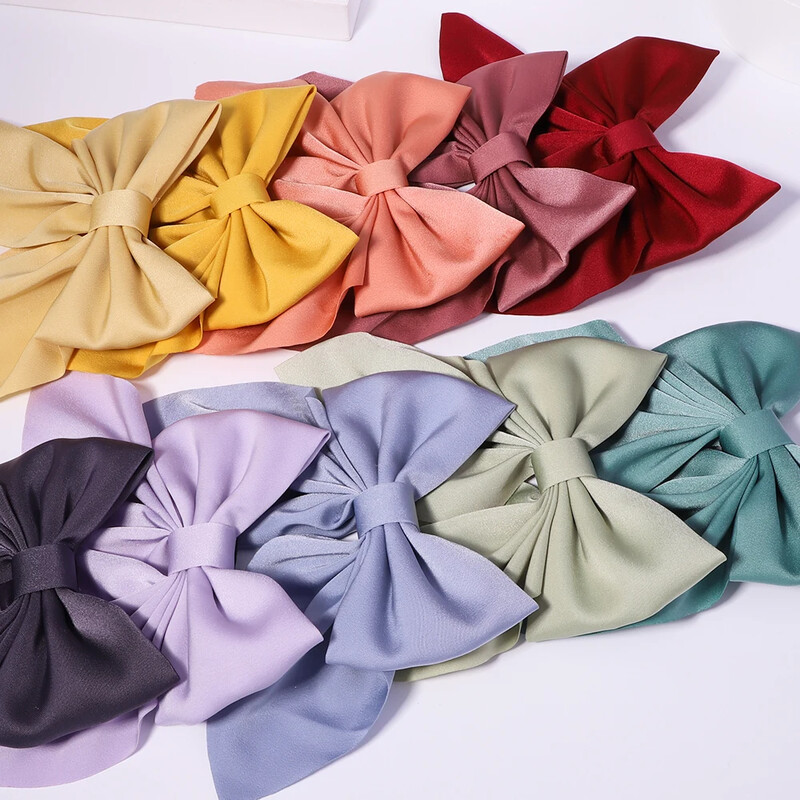 Új Sweet Bows Hajtűk Egyszínű Bowknot Hajcsatok Lányoknak Szatén Pillangó Barrettes Kacsacsőrű Clip gyerekeknek Hajkiegészítők