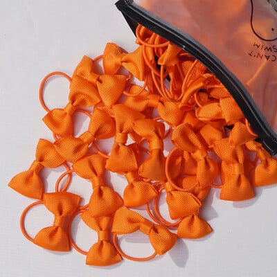 20/40 darabos 2 hüvelykes kislány haj masnik Rugalmas nyakkendők Grosgrain szalag masni gumiszalaggal lófarok tartók Hajkiegészítők