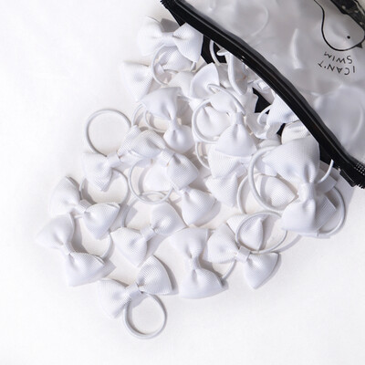 20/40 darabos 2 hüvelykes kislány haj masnik Rugalmas nyakkendők Grosgrain szalag masni gumiszalaggal lófarok tartók Hajkiegészítők