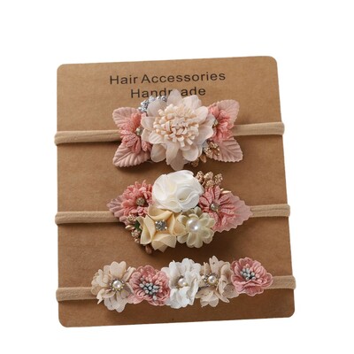 Baba fejpánt Virágok lányok elasztikus virágos hajpántok Újszülött kisgyermek fejfedők Nylon fejpántok gyerek haj kiegészítők 3db/tétel