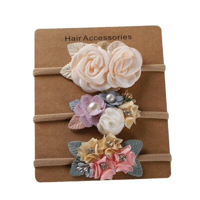 Baba fejpánt Virágok lányok elasztikus virágos hajpántok Újszülött kisgyermek fejfedők Nylon fejpántok gyerek haj kiegészítők 3db/tétel