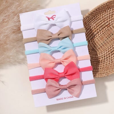 5/6 db lányok egyszínű, csípős fejpánt csecsemőknek Grograin szalagos fejfedők hajpántok csecsemők hajkiegészítők nagykereskedelme