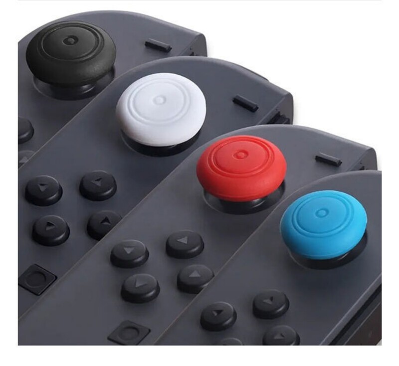 8 vnt. pakaitiniai silikoniniai nykščių svirties vairasvirtės dangteliai, skirti Nintend Switch valdiklio apsaugai silikoniniai lazdelių dangteliai, skirti Joycon