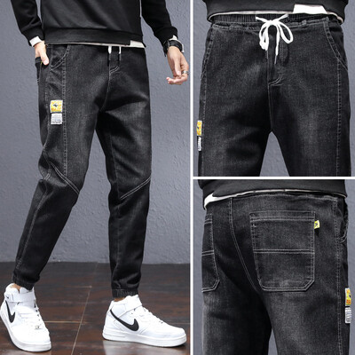 2020 m. žiemos vyrų mada, universalus laisvalaikio ilgos kelnės, vilnos pamušalas, pastorintas, madingi džinsai, medvilninė medžiaga, laisvas stilius