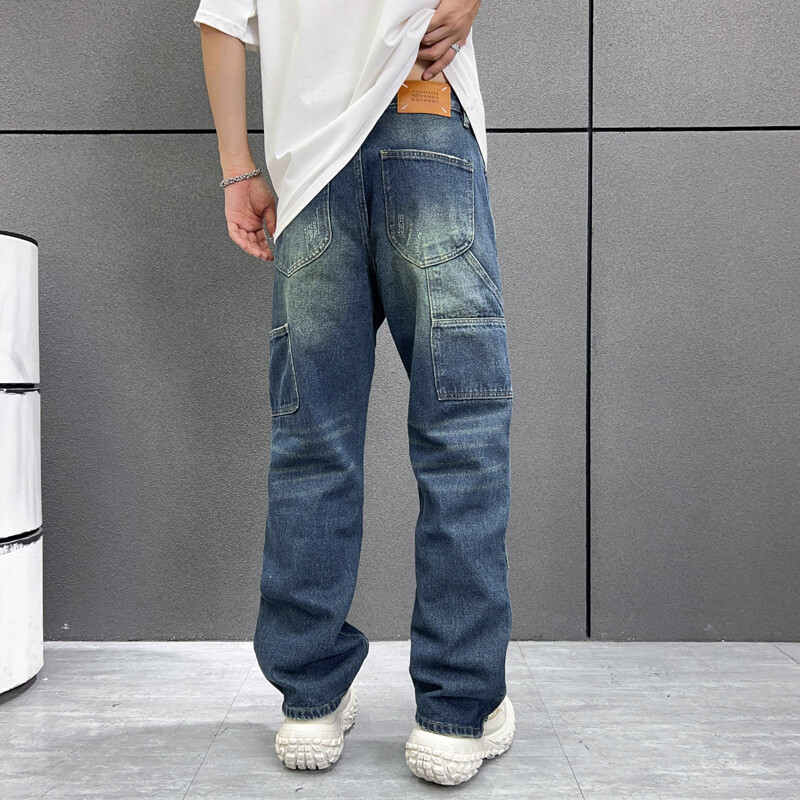 Išskalbti nelaimingi madingi ir madingi džinsai amerikietiško stiliaus madingi vyriški laisvi vyriški džinsai tiesiomis kojomis