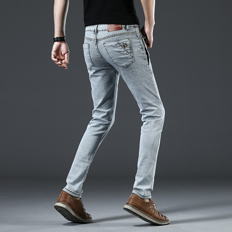 Nové sivé biele pánske ležérne klasické bavlnené trendy elastické mládežnícke ceruzkové džínsové nohavice módne útulné značkové slim džínsy
