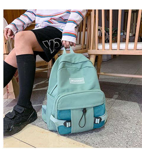 2024 m. pavasario nauja korėjietiško stiliaus nailono mokyklinė rankinė paprasta ir madinga vyriška ir moteriška kuprinė su tinkleline kišene