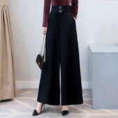 Fekete-fehér bő női nadrágok, magas derekú, széles szárú, elegáns ruhák, hétköznapi és egyszerű, irodai hölgy, őszi divat