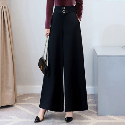 Fekete-fehér bő női nadrágok, magas derekú, széles szárú, elegáns ruhák, hétköznapi és egyszerű, irodai hölgy, őszi divat