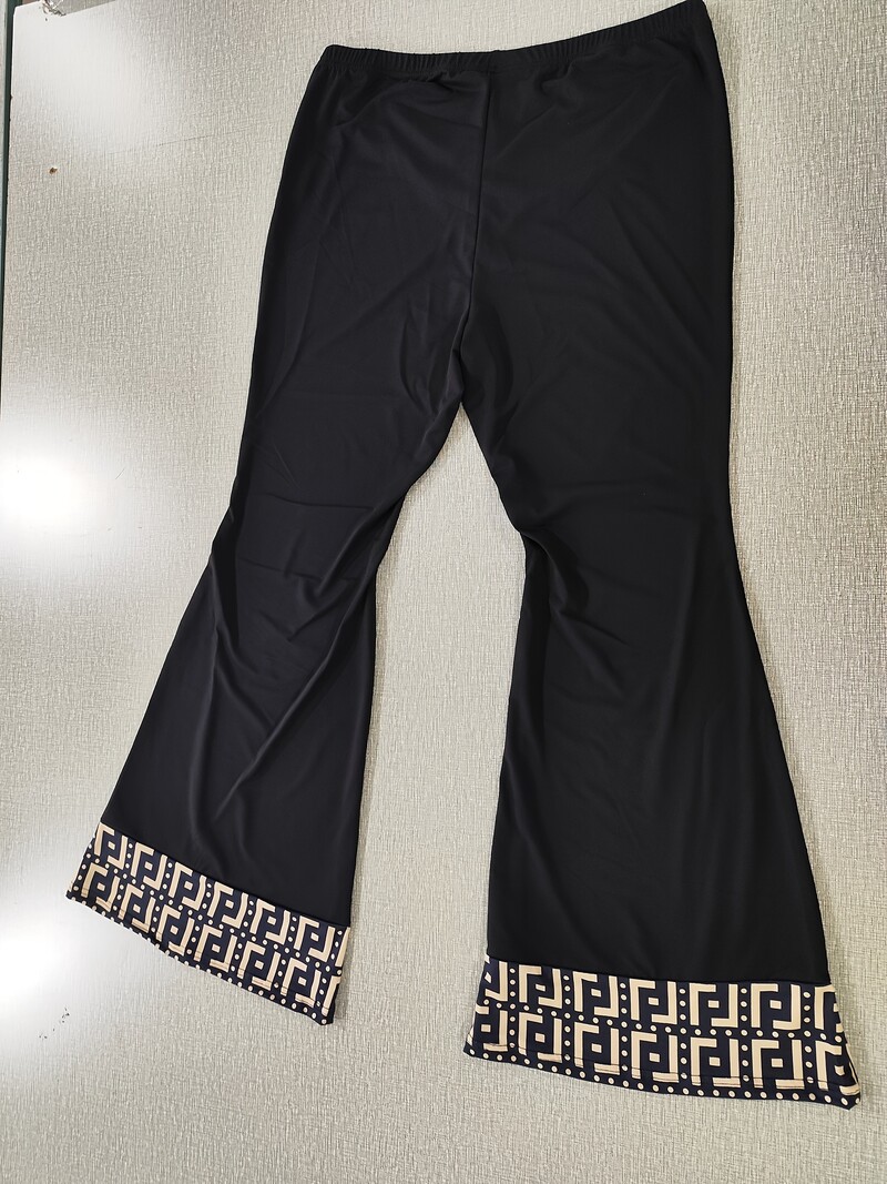 Nagy méretű, kiszélesedő szárú nadrág - nagy nyúlású, elegáns poliészter kötött anyagból, rugalmas derékrészből, egyszínű, egész évszakban használható hétköznapi viselet