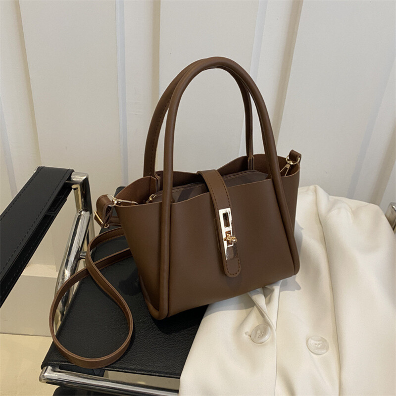 2025-ös új Pu bőr flitteres zártáska, egyszerű és divatos koreai kézitáska, sokoldalú textúrájú ingázó kereszttartó táska