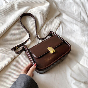 Egyszínű PU bőr kereszttestű női táskák 2023 tavaszi divat válltáskák Luxus kézitáskák és pénztárcák Női füles